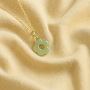 Collier estival en jade motif fleur de prunier